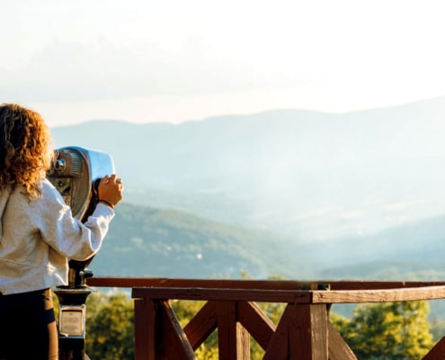 woman looking at mountains