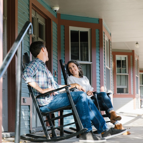 couple sitting on the front porch