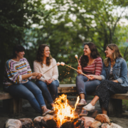group of girls at Porches with smores by the fire